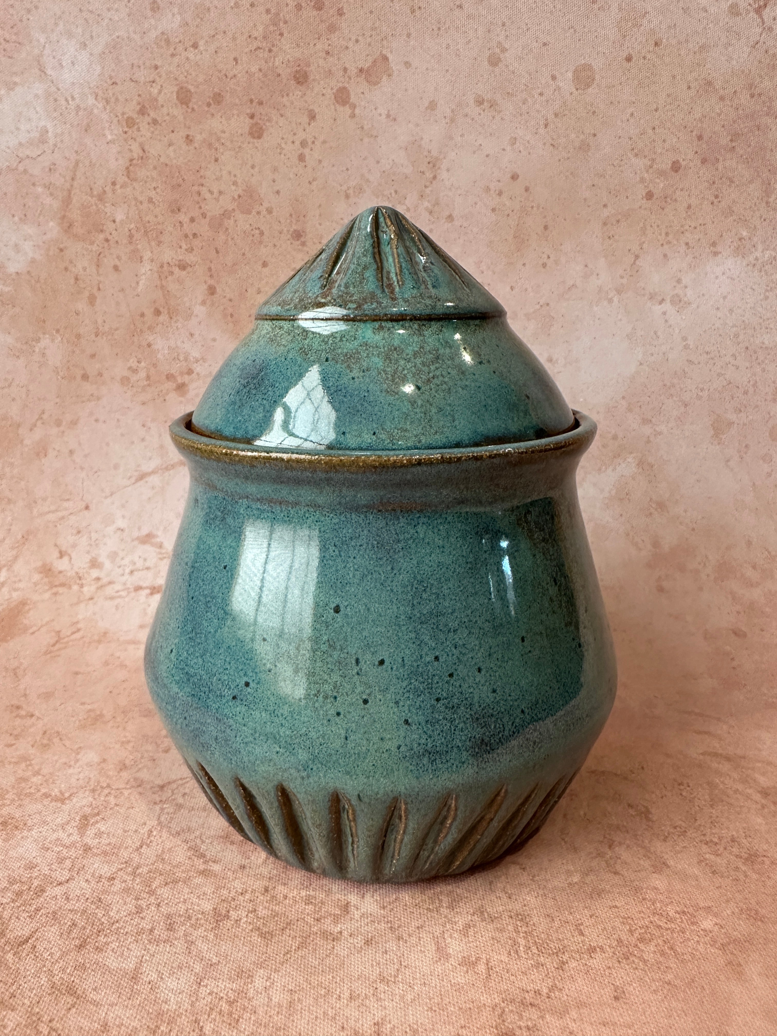 Handcrafted stoneware lidded vessel