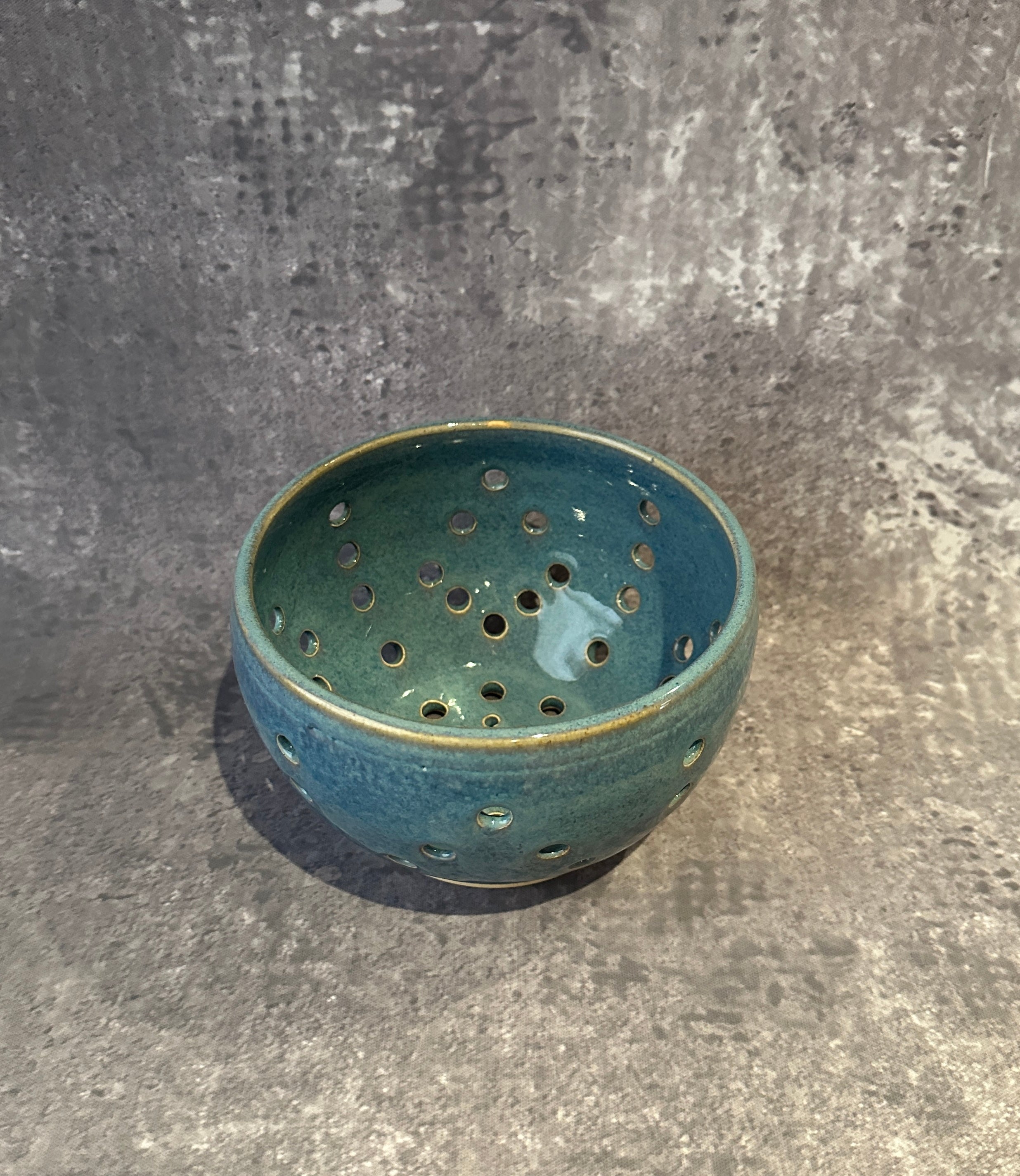 Wheel thrown blue berry bowl