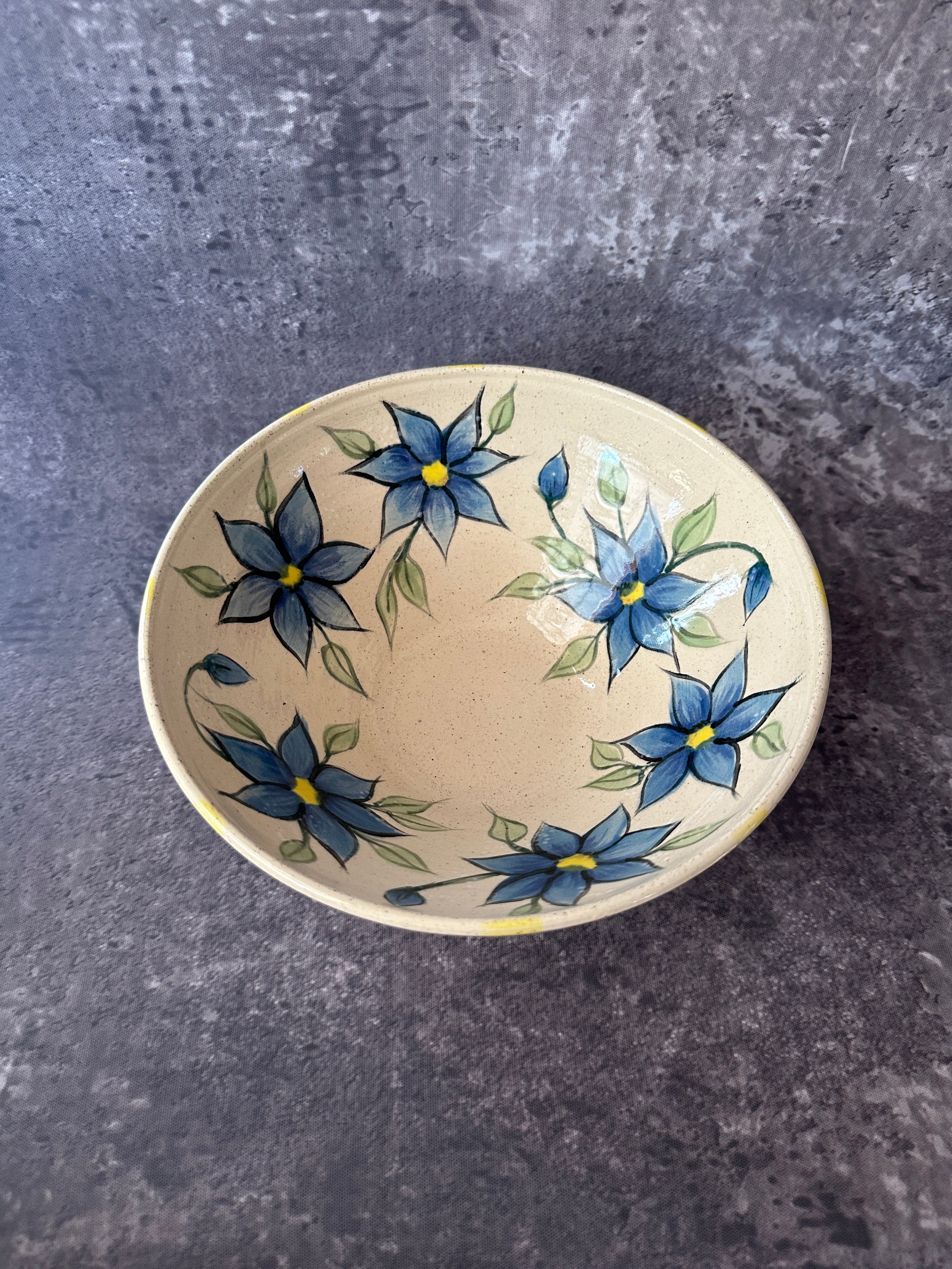 Floral painted wheel thrown handcrafted pottery bowl