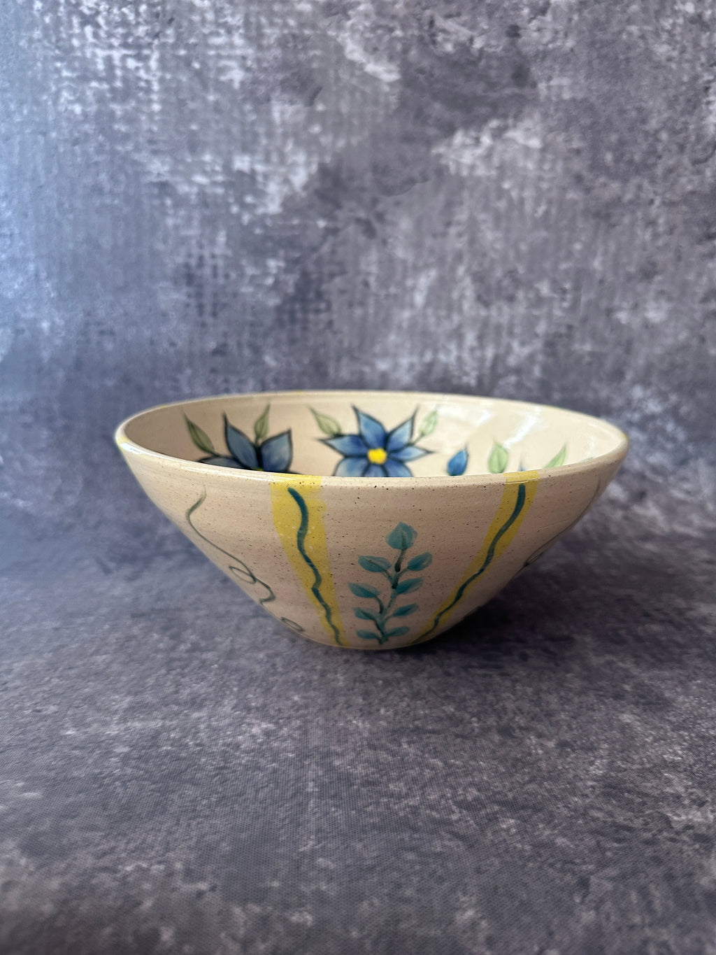 Handcrafted wheel thrown floral bowl