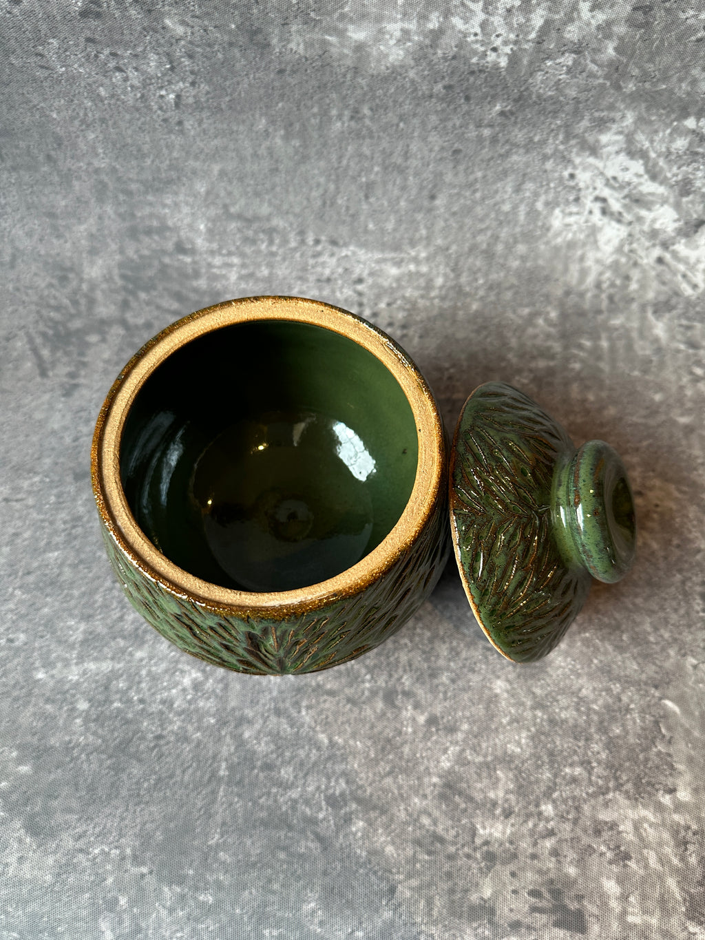 Green carved Stoneware lidded vessel handcrafted