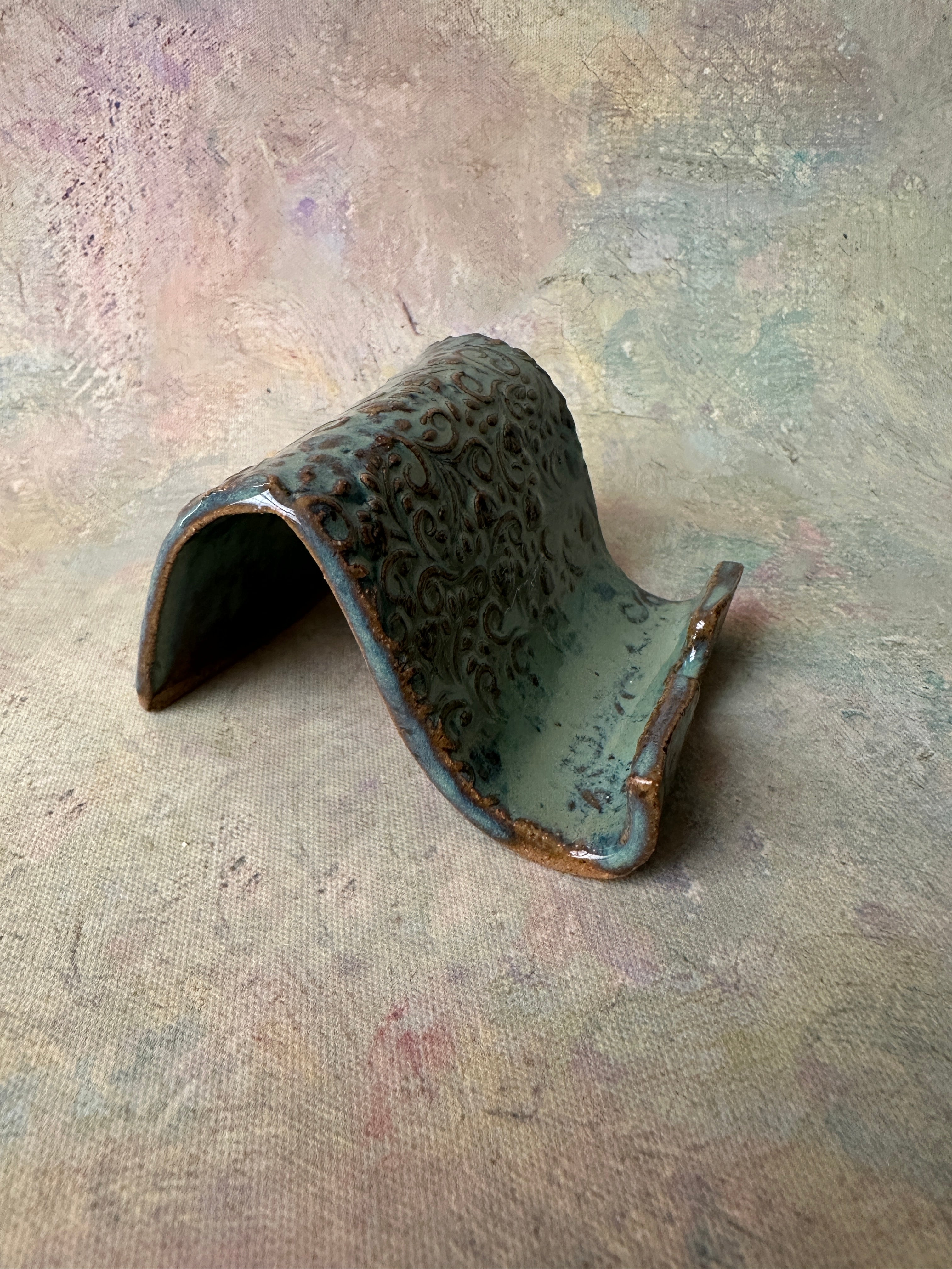 Green handcrafted cell phone holder