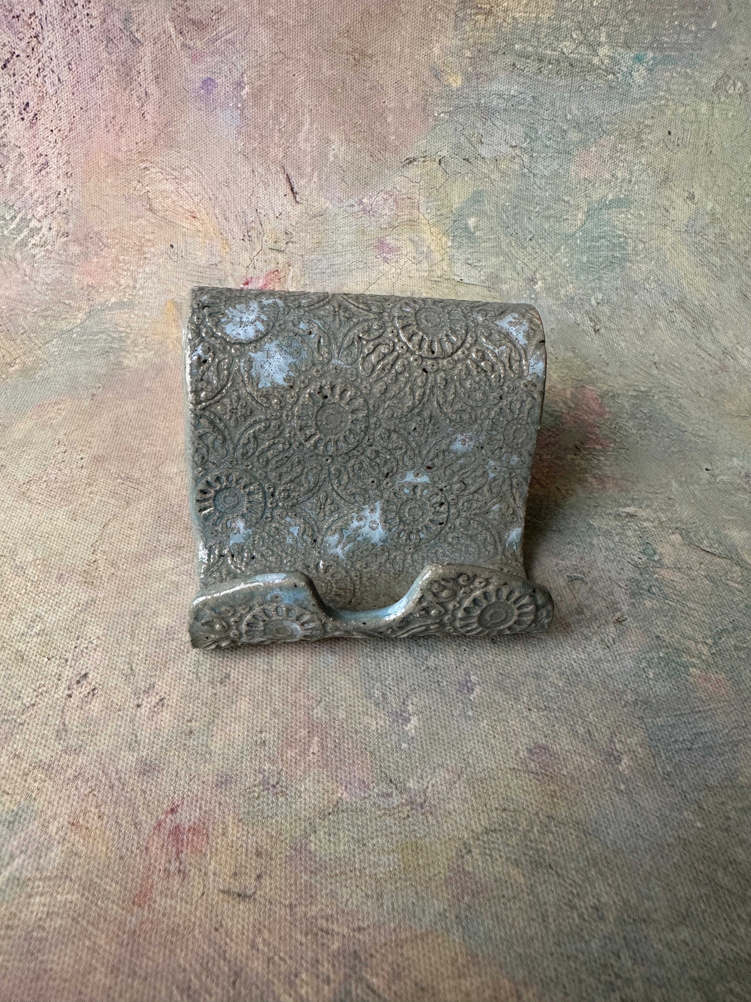 Light green ceramic pottery cell phone holder