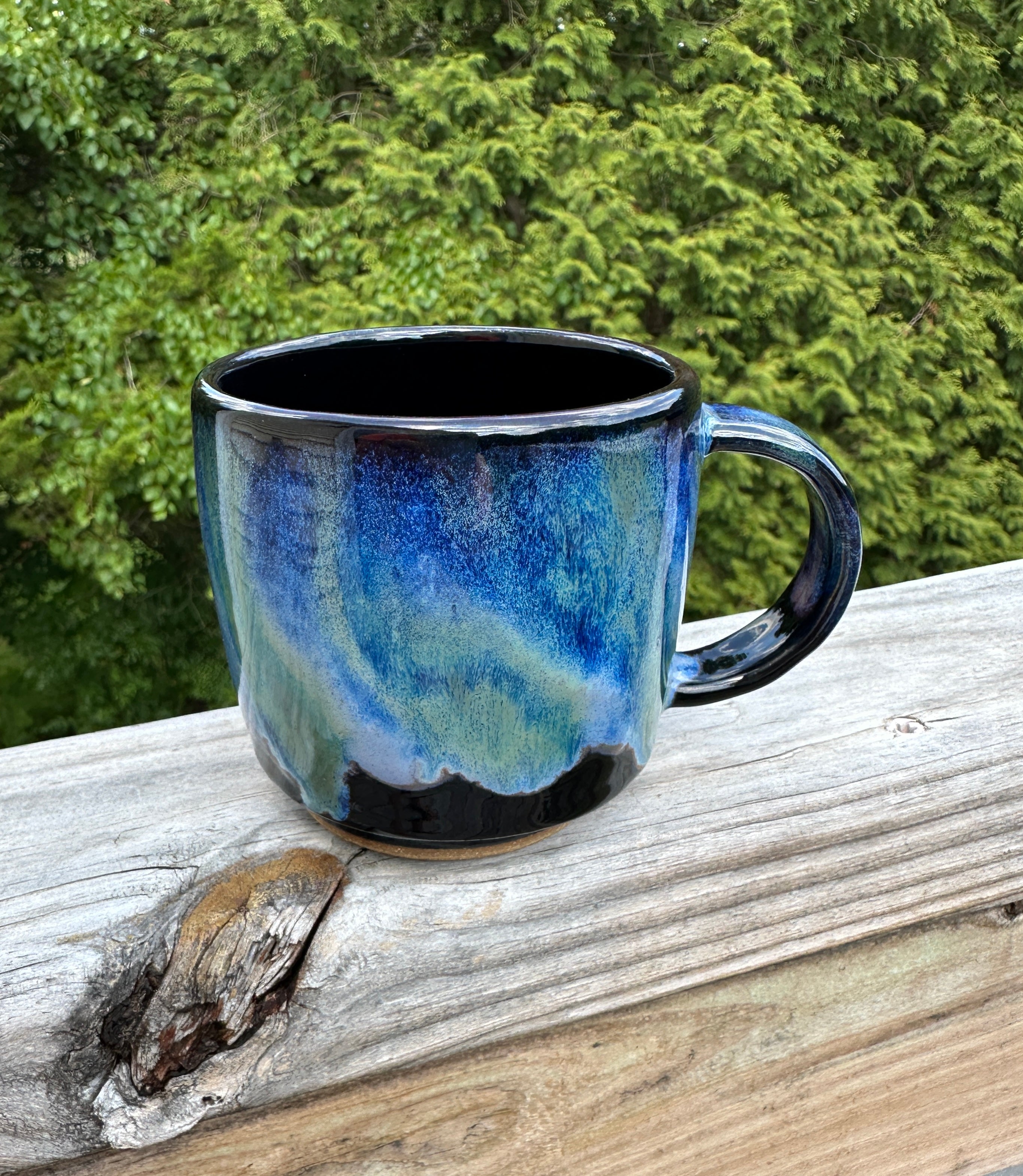 Hancrafted Stoneware mug in blue and greens