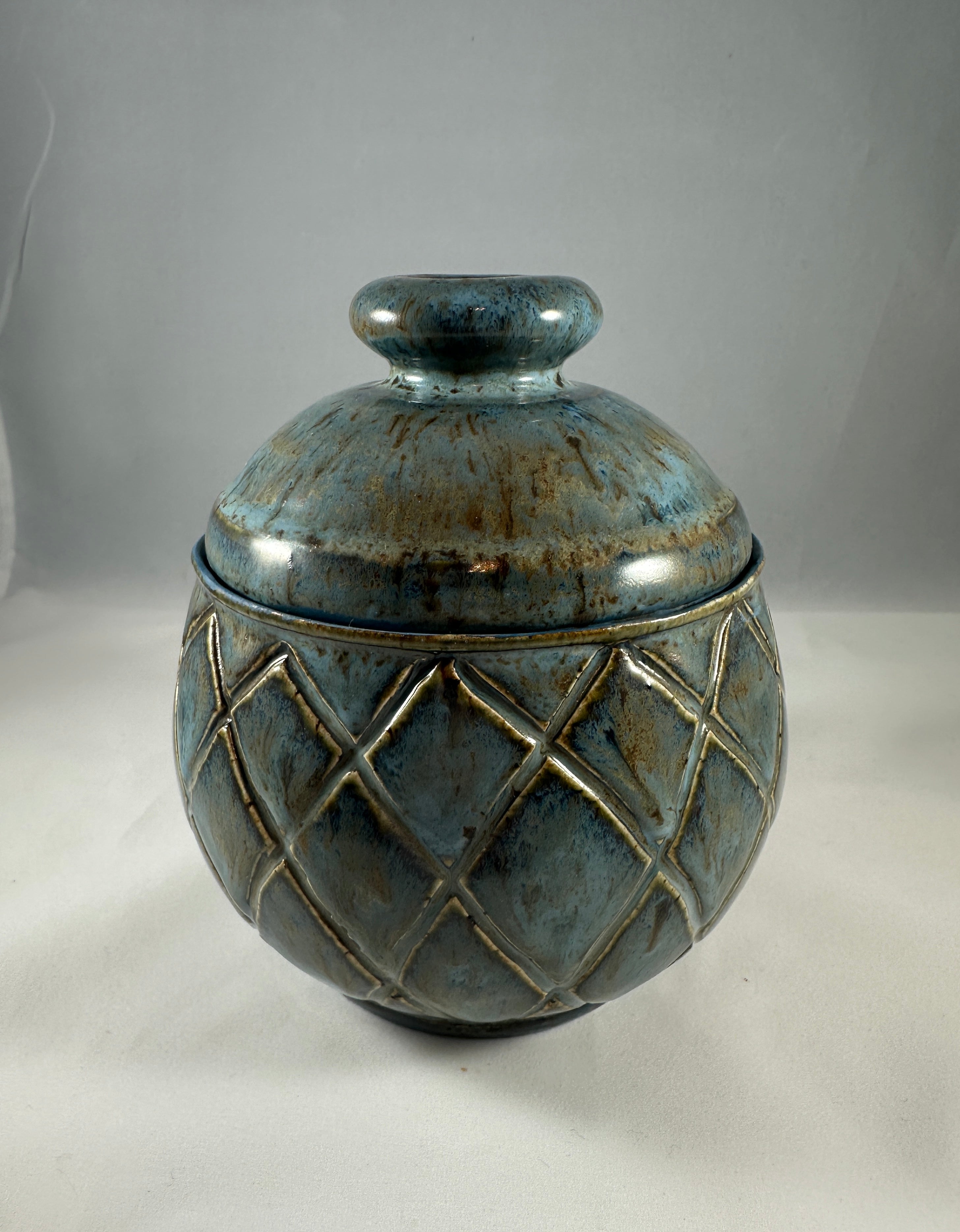 Greenish Blue Carved Lidded Vessel